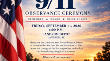 An American flag in the foreground. A white rose sits on top of an image of the Ground Zero memorial at the bottom. The Landrum Area Fire and Rescue District Logo is at the top of the image. Information about the ceremony is in the center of the image.